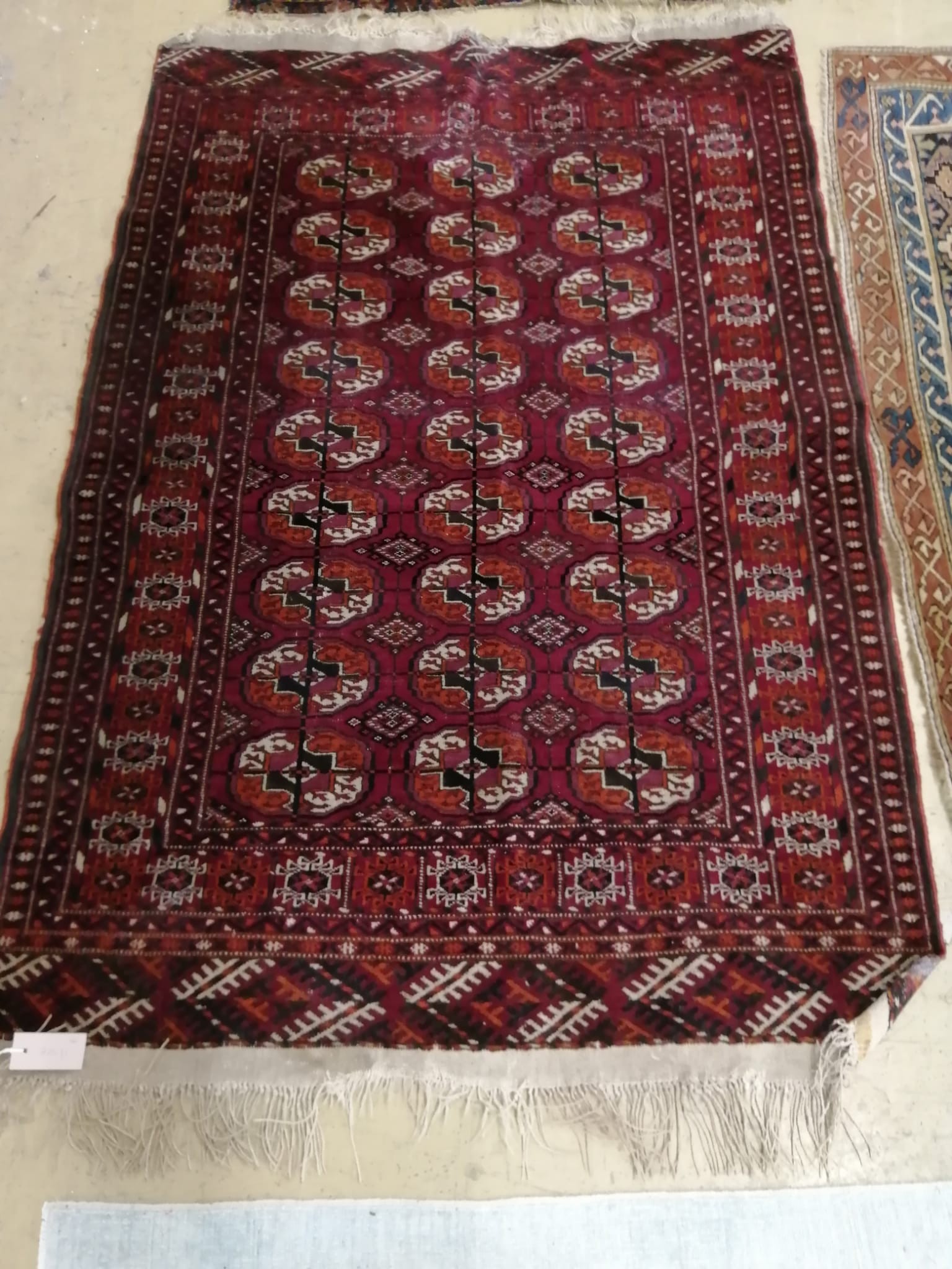A Bokhara rug together with a Caucasian prayer mat, larger 150 x 104cm